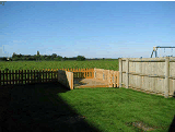Aperitif decking with views to open countryside in Upwell