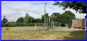 Floodlit basketball practice hoop